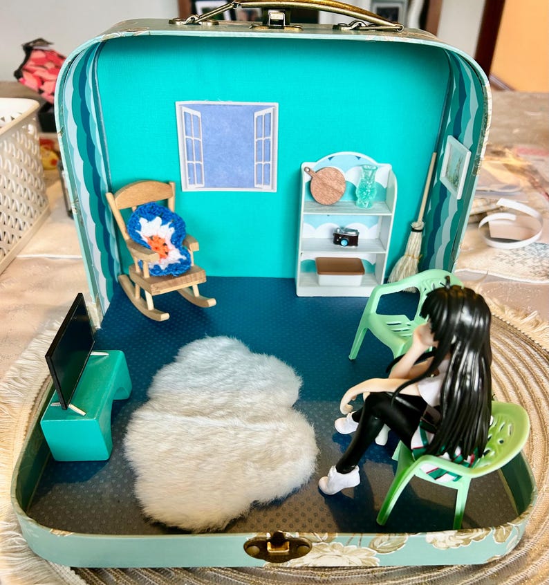 Anime Doll scene in a suitcase